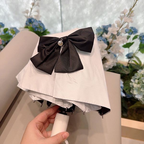 お洒落に♪シャネル 雨晴兼用折りたたみ傘 スーパーコピー shs47557